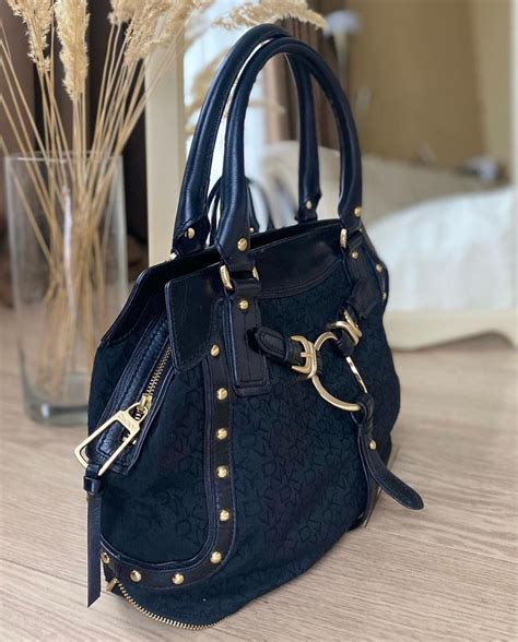 navy blue leather handbag designer.